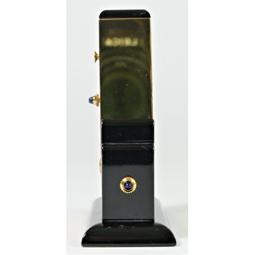 303 - Cartier, an Art Deco style gilt brass and lacquer adjustable quartz alarm clock, numbered 890701551,... 