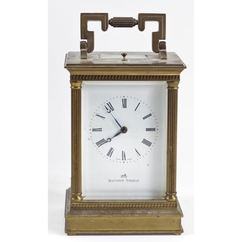 312 - Matthew Norman, a gilt brass half hour striking and repeating carriage clock, white enamel dial with... 