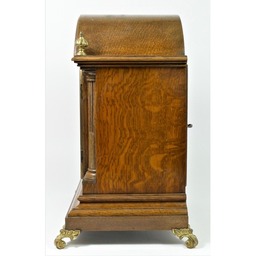 316 - Winterhalder & Hofmeier, an Edwardian oak mantle clock, the gilt arched dial with silvered chapter r... 