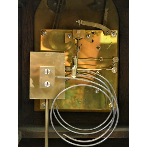 316 - Winterhalder & Hofmeier, an Edwardian oak mantle clock, the gilt arched dial with silvered chapter r... 