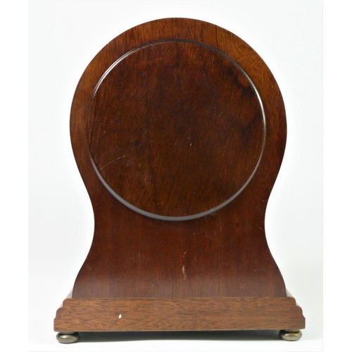 317 - Woodford, a mahogany balloon mantle clock, the white enamel dial signed, the 8 day movement by Franz... 