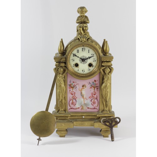 318 - A 19th century French gilt metal and porcelain mantle clock, the dial with Arabic numerals, the case... 