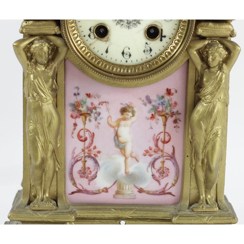 318 - A 19th century French gilt metal and porcelain mantle clock, the dial with Arabic numerals, the case... 