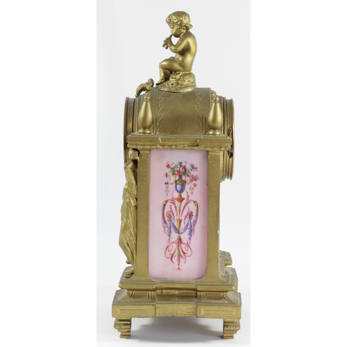 318 - A 19th century French gilt metal and porcelain mantle clock, the dial with Arabic numerals, the case... 