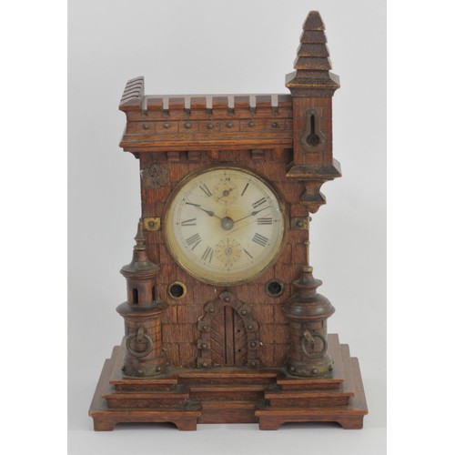 320 - A Rye Fortress alarm novelty mantle clock, retailed by J.N. Masters, Rye, Sussex, the architectural ... 