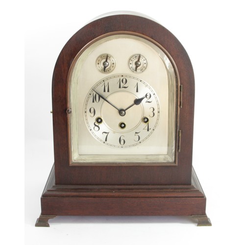 323 - An Edwardian mahogany chiming and striking mantle clock, the silvered dial with subsidiary chime/sil... 