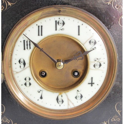 324 - A late 19th century French black slate mantel clock, the ivorine dial to a signed movement, striking... 