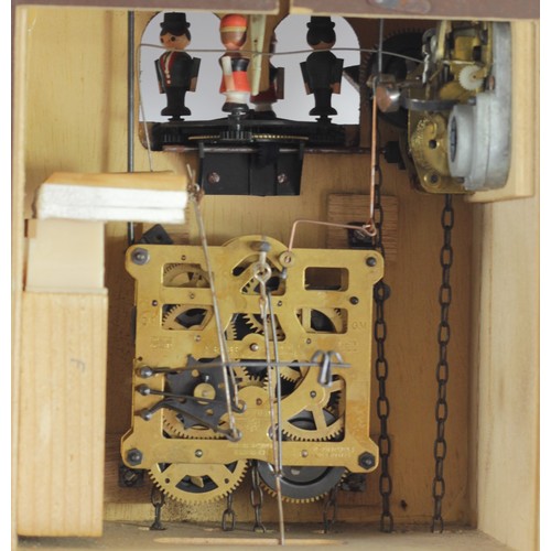 327 - Albert Schwab, Karlsrune, a Black Forest musical cuckoo clock, the case with revolving characters, b... 