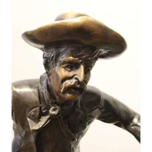 339 - After Frederick Remmington, bronco buster, a bronze group, modelled as a cowboy on a rearing horse, ... 