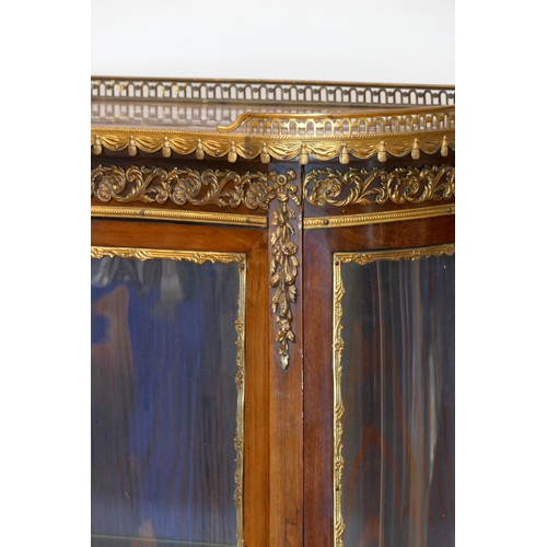 351 - A 19th century French mahogany display cabinet, the variegated brown marble top with gilt metal 3/4 ... 