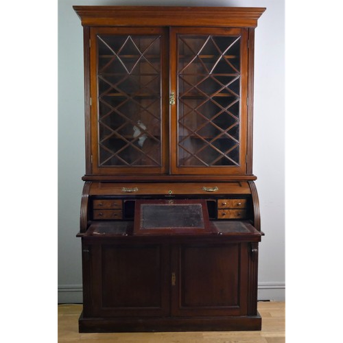 354 - John Easten & Sons, Hull, a late Victorian mahogany bureau bookcase, the outswept pediment over a pa... 