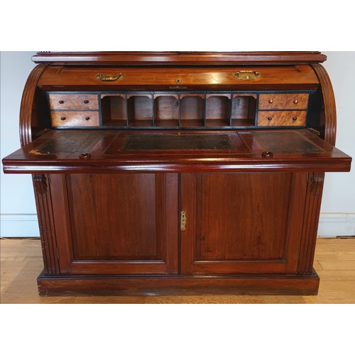 354 - John Easten & Sons, Hull, a late Victorian mahogany bureau bookcase, the outswept pediment over a pa... 