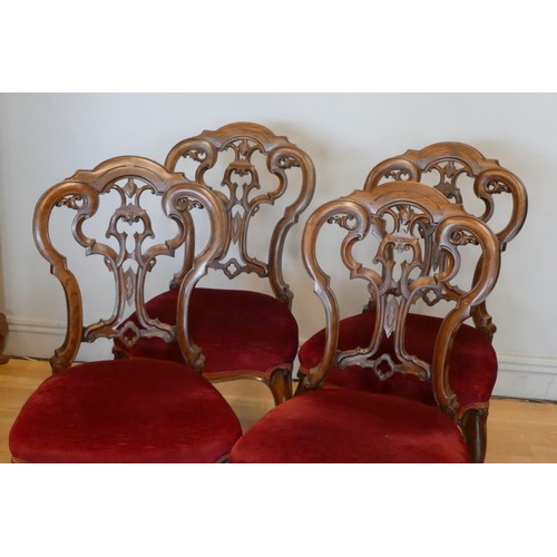 363 - A Victorian set of four mahogany parlor chairs, carved scroll backs, upholstered seats and cabriole ... 