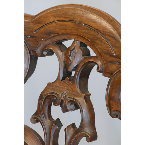 363 - A Victorian set of four mahogany parlor chairs, carved scroll backs, upholstered seats and cabriole ... 