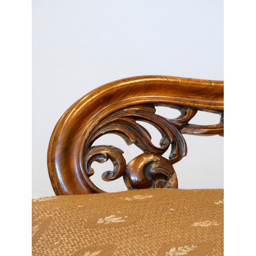 367 - A Victorian carved rosewood button back parlour chair, with carved cabriole front supports, 97 x 72c... 