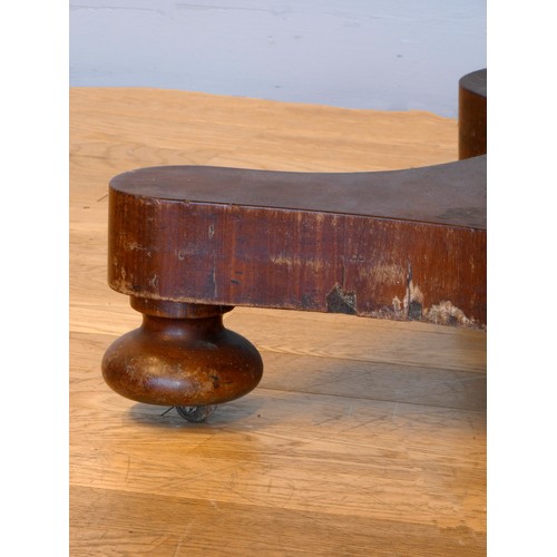 368 - A 19th century fold over side table, with swivel top, raised on an octagonal baluster stem, quatrefo... 