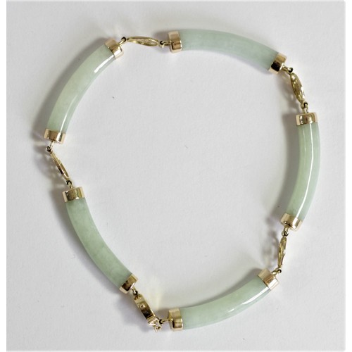 176A - A Chinese 14ct gold mounted jadeite panel bracelet, by VVV, Birmingham import mark 1999, 19cm.