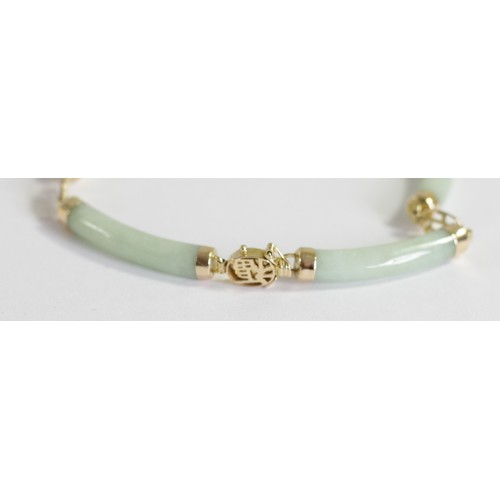 176A - A Chinese 14ct gold mounted jadeite panel bracelet, by VVV, Birmingham import mark 1999, 19cm.