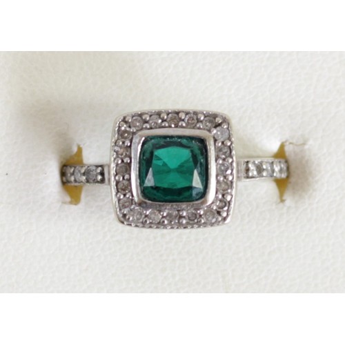 177 - An Art Deco style white gold, synthetic emerald and diamond cluster ring, tests as 9ct, collet set w... 