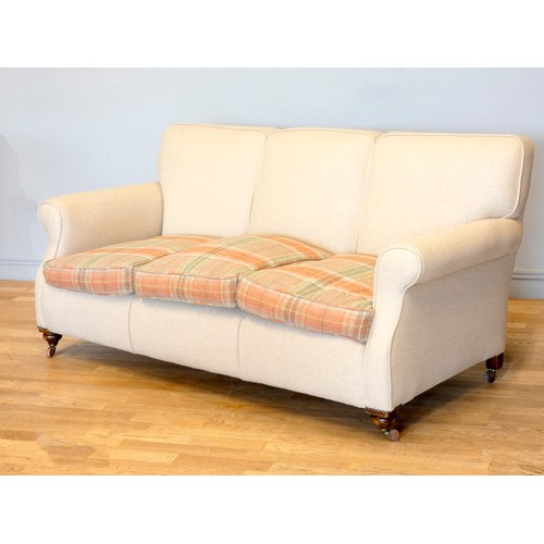 359 - An Edwardian mahogany framed three seat sofa, scroll arms, recently recovered with tan wool fabric a... 