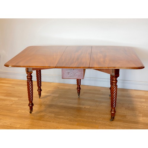 370 - A 19ct century mahogany drop leaf dining table, with tapering spiral turned legs, brass castors, 157... 