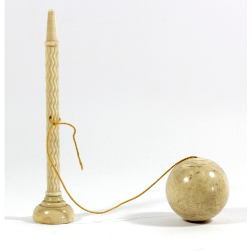 278A - A 19th Century ivory bilboquet cup and ball game, diameter 45mm