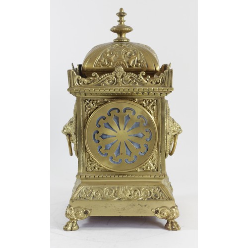 98 - A late 19th century ornate cast brass mantel clock, off white enamel chapter ring with Roman numeral... 