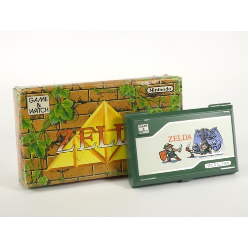 63 - A Nintendo Game & Watch (Zelda) multiscreen handheld game (serial No 45051110), original box and pol... 