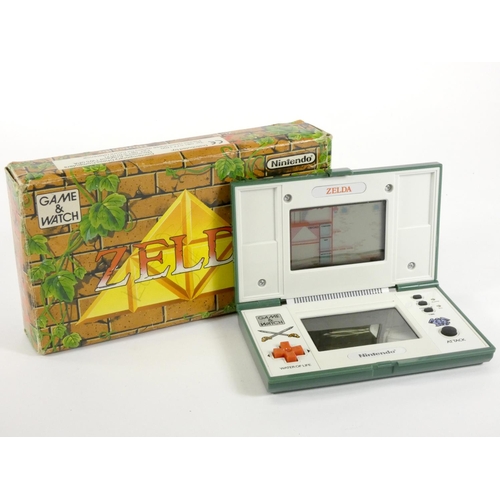 63 - A Nintendo Game & Watch (Zelda) multiscreen handheld game (serial No 45051110), original box and pol... 