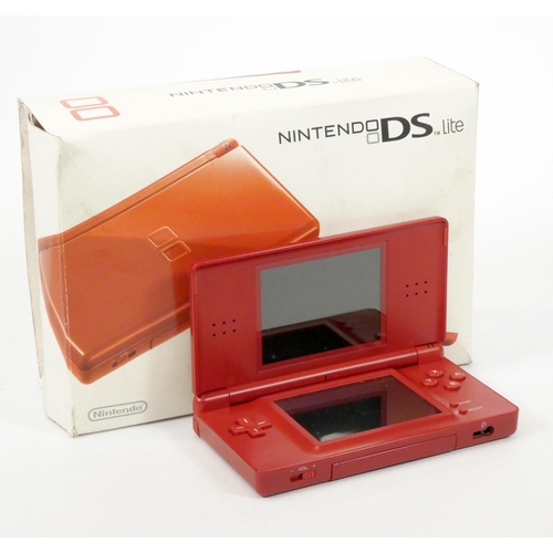 72 - A Nintendo DS Lite console, red, with charger, stylus, manuals and original box, together with Brain... 