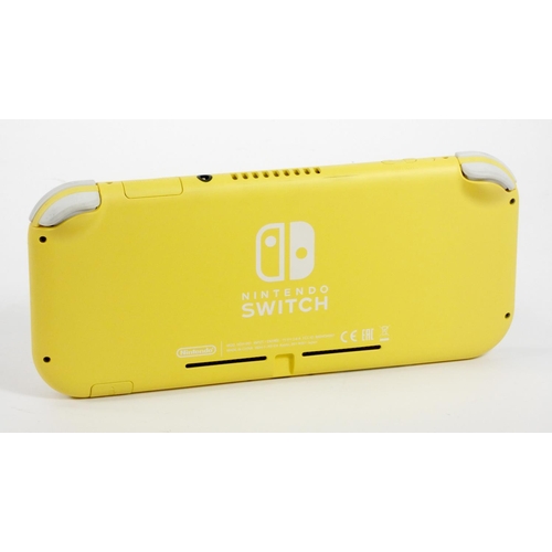 74 - A Nintendo Switch Lite console, 32GB, Yellow, with charger and Stealth carry case