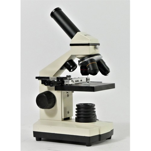 92 - A Bresser Biolux NV microscope, carry case, power cable, lens, tools, accessories, slides and should... 