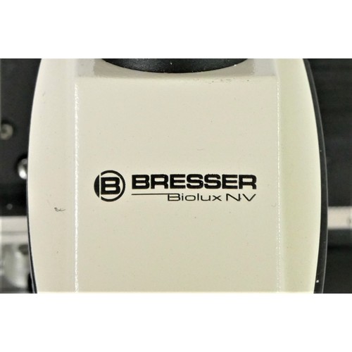 92 - A Bresser Biolux NV microscope, carry case, power cable, lens, tools, accessories, slides and should... 