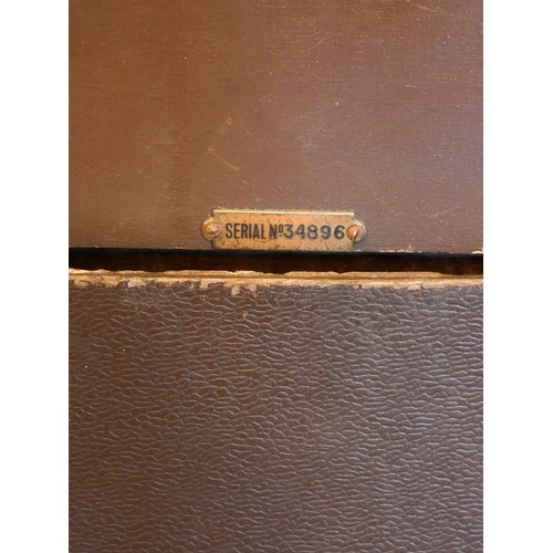 94 - An un-branded floor standing valve radio (serial No 34896), believed to be 1930s, mahogany case, wit... 