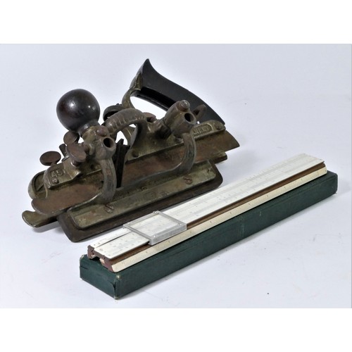 97 - A Stanley No45 combination plane, cast metal with floral pattern and wooden furniture, together with... 