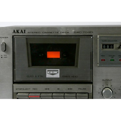 103 - An Akai stereo intergrated amplfier (model AM-2250), with leads and original box, together with a Ak... 