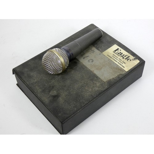 140 - An Eagle M90 unidirectional microphone, original box and cable, together with a Primo EM-4000 lapel ... 