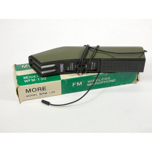 140 - An Eagle M90 unidirectional microphone, original box and cable, together with a Primo EM-4000 lapel ... 