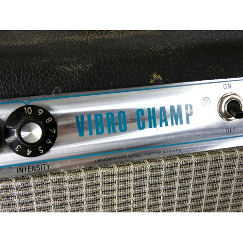 142 - A Fender Vibro Champ tube amp (serial No 40374), 1977, with manual and dust cover