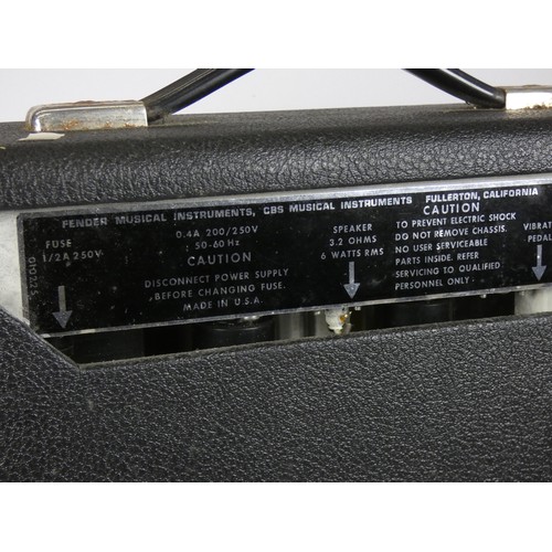 142 - A Fender Vibro Champ tube amp (serial No 40374), 1977, with manual and dust cover