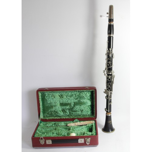 145 - A Corton clarinet, made in Czechoslovakia, with brush and reed, fitted interior carry case