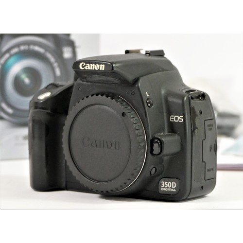 164 - A Canon 350D, battery, charger, manuals and disks, together with two CF cards, 512mb and 2gb