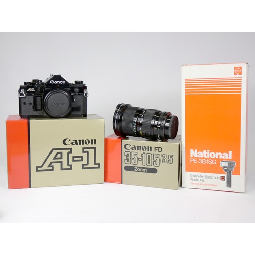 173 - A Canon A-1 (2291210) 35 mm camera, manual and original box, a Canon Motor Drive MA, manual, a Canon... 