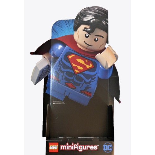 175 - A Lego Minifigure dispenser, DC-20-1, with Lego and DC branding, in the form of Lego Superman, boxed... 