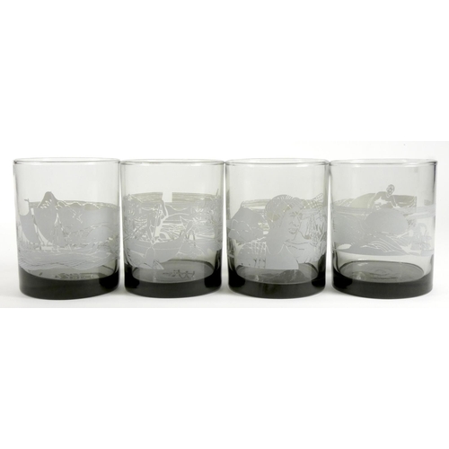 181 - A set of four McDonalds USA smoked glass Hawaii Tiki tumblers, c.1970s, depicting Hawaiian themed wa... 