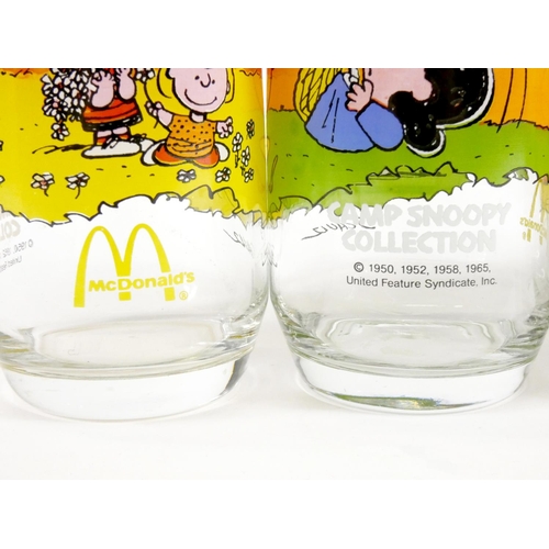 182 - A set of five McDonalds USA Camp Snoopy highball glasses, depicting comic strips from Snoopy, includ... 