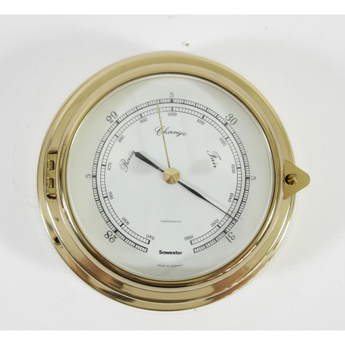 192 - A brass ships bulkhead portal barometer, Yachtmaster by GRM of England, the barometer hinged, glass ... 