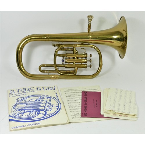 134 - A B&S Flugelhorn, stamped with 52202 and makers mark on the horn, together with two mouth pieces, sh... 