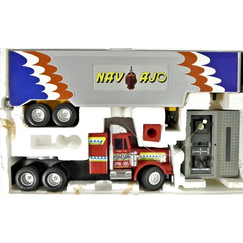 201 - A Radio controlled Supertrailer, 1:25 scale, remote and original box, together with a Locomotora Vir... 