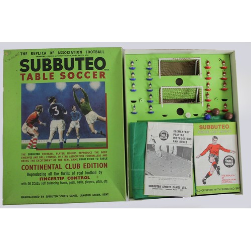 216 - Subbuteo table soccer, boxed (missing one red player and base for one goalkeeper, together with two ... 